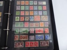 An Album of GB and Commonwealth Mint Stamps.