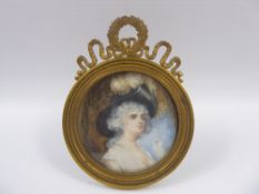 A 18th Century Portrait Miniature on Ivory, depicting a young woman, approx 6.5 x 6.5 cms