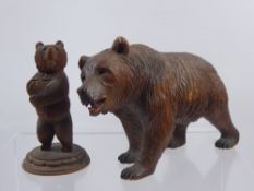 An Antique German Black Forest Bear, hand painted jaw, ht approx 22 x 14 cms. (af) together with a