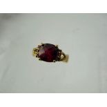 A Lady's Gems 9 ct Gold Solitaire Garnet Ring, garnet 8 mm, approx 1.9 ct size N, approx 3.9 gms,