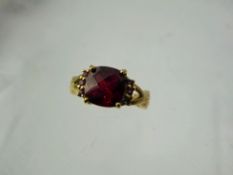 A Lady's Gems 9 ct Gold Solitaire Garnet Ring, garnet 8 mm, approx 1.9 ct size N, approx 3.9 gms,