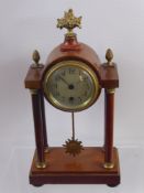 A HAC Fruit Wood Mantel Clock, the clock with four column supports and brass finial, floral