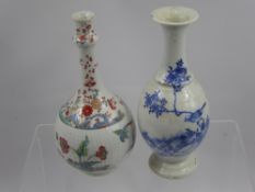 Two Chinese Porcelain Vases, one blue and white depicting birds, Qianlong marks to base, approx 21