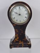 A 19th Century Tortoiseshell Cased Mantel Clock, with white enamel Roman dial, S & F Movement,