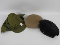 A Beige WWII SAS Beret with the original cloth Badge