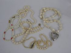 A Miscellaneous Collection of Pearl Necklaces, including a graduated with marcasite clasp approx