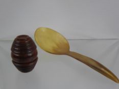 An Antique Treen Barrel Chestnut Grater, together with a horn serving spoon. (2)