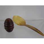 An Antique Treen Barrel Chestnut Grater, together with a horn serving spoon. (2)