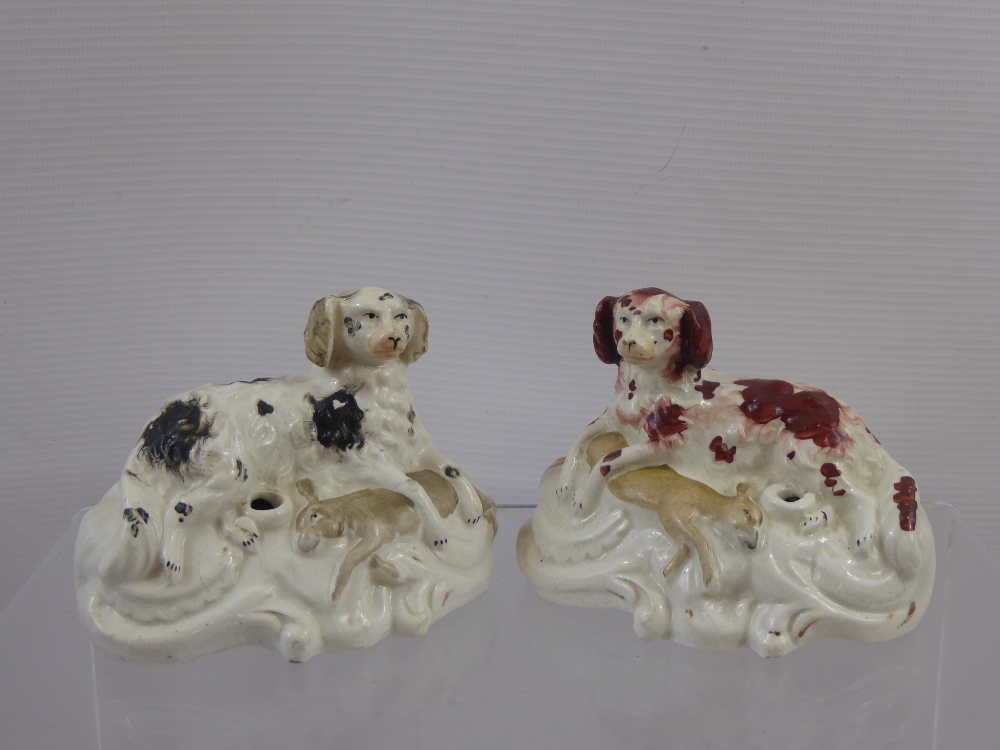 A Pair of 19th Century Staffordshire Quill Holder's, depicting spaniel and hare, approx 13 x 8 cms.