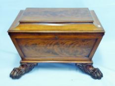 An Elegant Regency Sarcophagus-Shape Flame Mahogany Wine/Champagne Cooler, the cooler having