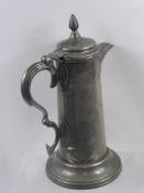 An English Pewter Spire Flagon, inscribed and dated 1863, TOWLAW, County Durham, approx 36 cms.