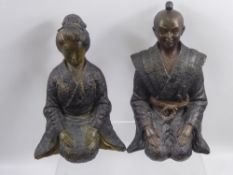 A Pair of Japanese Bronzed Metal Kneeling Figures, one depicting a Samuri, the other a lady in