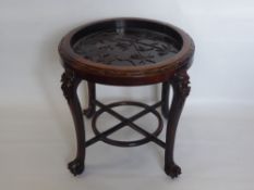 A Chinese Huali Low Tea Table, the top intricately carved with heron amongst bamboo reeds, the table