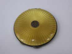 A Silver and Gold Guilloche Enamel Compact, London hallmark, dated 1930, mm CNC, approx 89 gms.