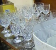 A Quantity of Crystal Glasses, including six short stemmed wine glasses, six long stemmed glasses,