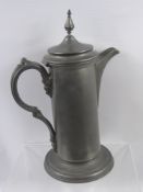 An English Pewter Spire Flagon, by Phillip Ashberry & Sons, circ 1865, approx 36 cms high.