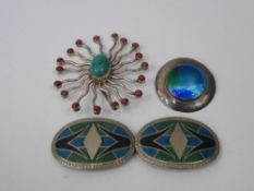 A Silver Turquoise and Red Stone Sun Pendant, together with a silver metal enamel buckle and a