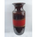 A West German 'Scheurich Keramic' Pillar Vase, with red and brown glaze, approx 41 cms