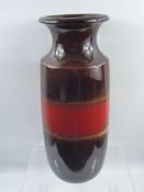 A West German 'Scheurich Keramic' Pillar Vase, with red and brown glaze, approx 41 cms