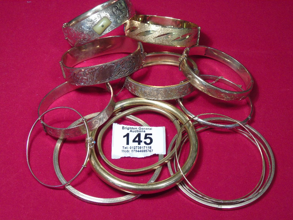 COLLECTION OF YELLOW METAL BRACELETS