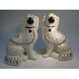 PAIR OF STAFFORDSHIRE STYLE DOGS