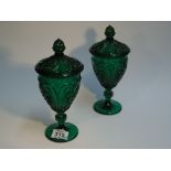 2 X GREEN GLASS LIDDED VASES