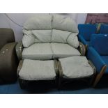 GREEN CANE SOFA & 2 FOOTSTOOLS