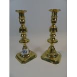 PAIR OF BRASS AND COPPER CANDLESTICKS