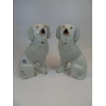 PAIR OF STAFFORDSHIRE WHITE POODLE DOGS