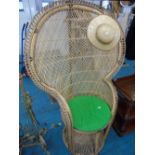 PEACOCK CHAIR AND PITH HELMET