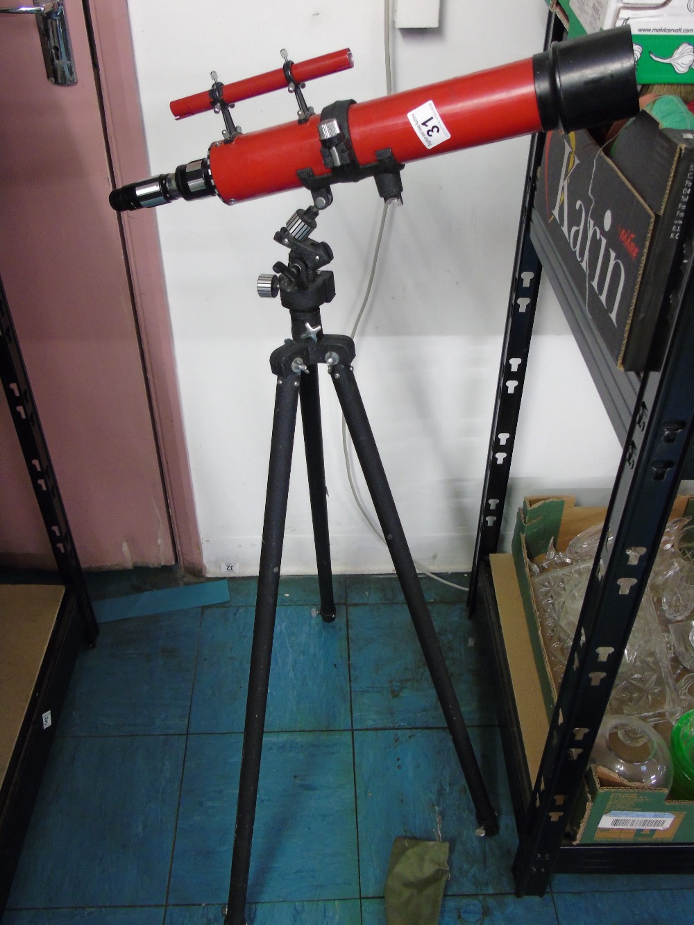 RED TELESCOPE ON STAND