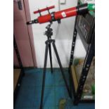 RED TELESCOPE ON STAND