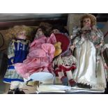 6 COLLECTABLE DOLLS