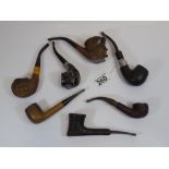 7 ASSORTED PIPES, SOME CARVED