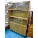 BOOKCASE CUPBOARD WITH SLIDING GLASS DOORS
