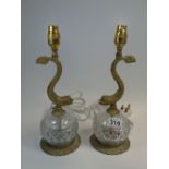 PAIR OF TABLE LAMPS WITH DOLPHIN DECORATION ON GLASS BASES