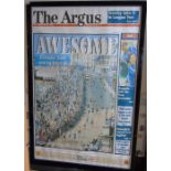 FRAMED BLOW UP OF THE FRONT PAGE OF THE ARGUS 'AWESOME' RELATING TO THE SUCCESS OF THE BRIGHTON