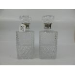 PAIR OF DECANTERS WITH HALL MARKED SILVER COLLARS