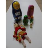 VINTAGE CHINESE DOLL & SET OF NESTING RUSSIAN DOLLS