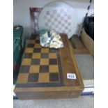 LARGE WOODEN COMPENDIUM BOX, 2 MARBLE CHESS BOARDS & 4 CHESS SETS