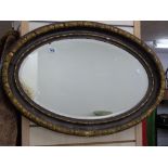 OVAL MIRROR WITH DECORATIVE FRAME & BEVELLED GLASS