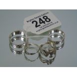 4 SILVER RINGS INCLUDING EAGLE RING WITH SEMI PRECIOUS STONE