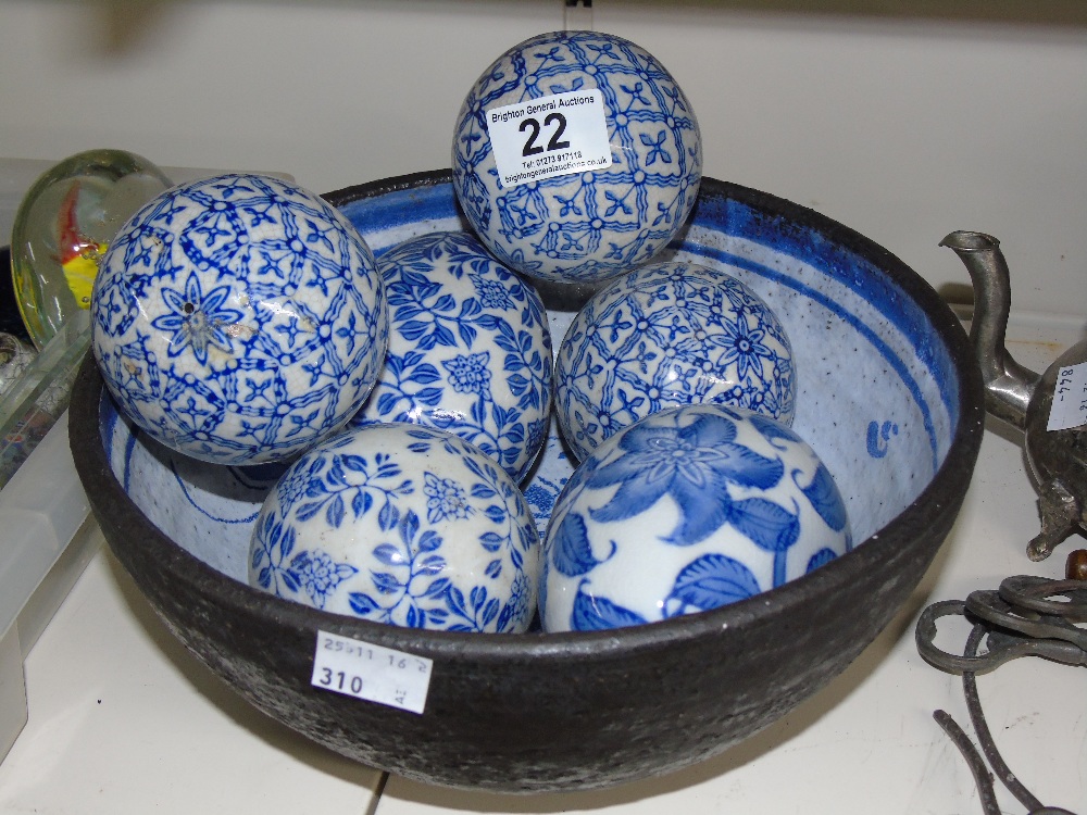 CERAMIC BLUE & WHITE BALLS IN AN ORIENTAL STYLE BOWL