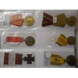 medal collection in album 35 plus n4 odds noted War Merit n1939, Phillipines WW2 Defence, USA