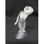 A Lalique figurine of a naked lady, marks to the base