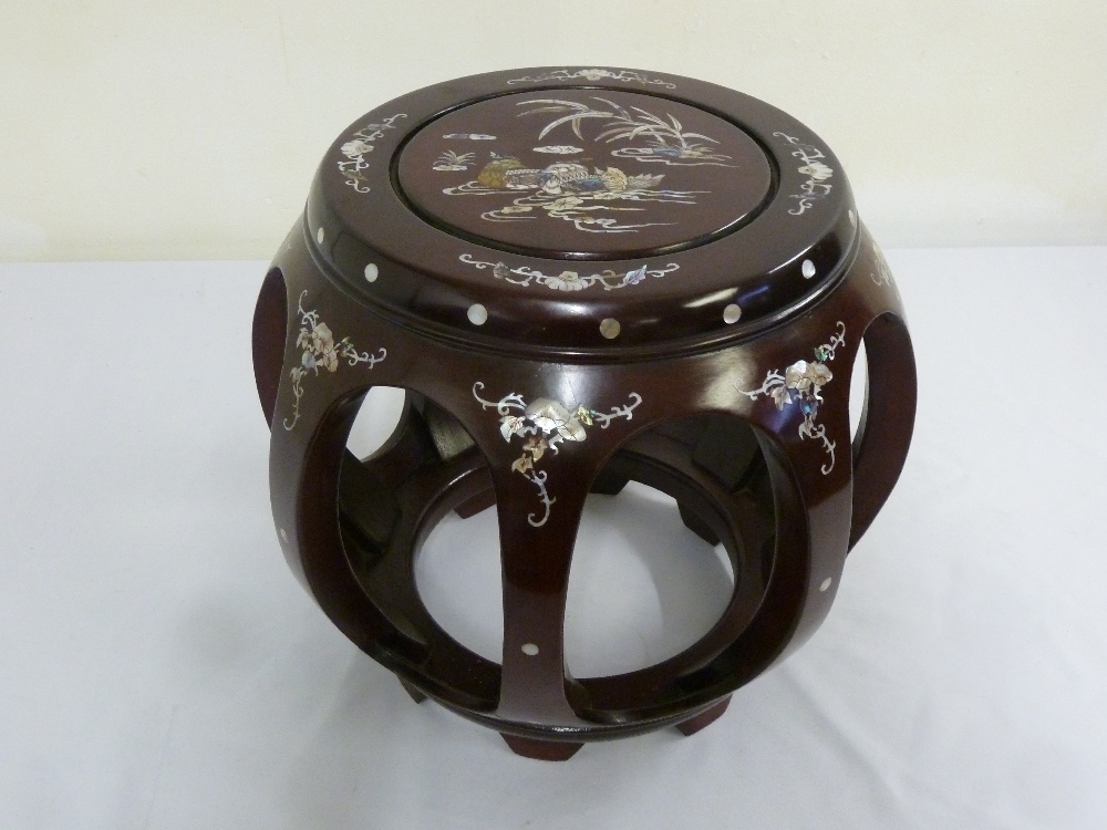 Oriental hardwood barrel seat, set with Mother of Pearl inlays