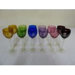Twelve coloured hock glasses