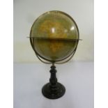 A Victorian globe by Ch. Perigot with brass mounts on turned wooden pedestal stand