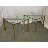 A pair of 1970s brass tables with detachable glass tops (glass tops a/f)