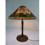 Tiffany Studios leaded glass and bronze table lamp circa 1910, signed to the base 64cm(h), from a